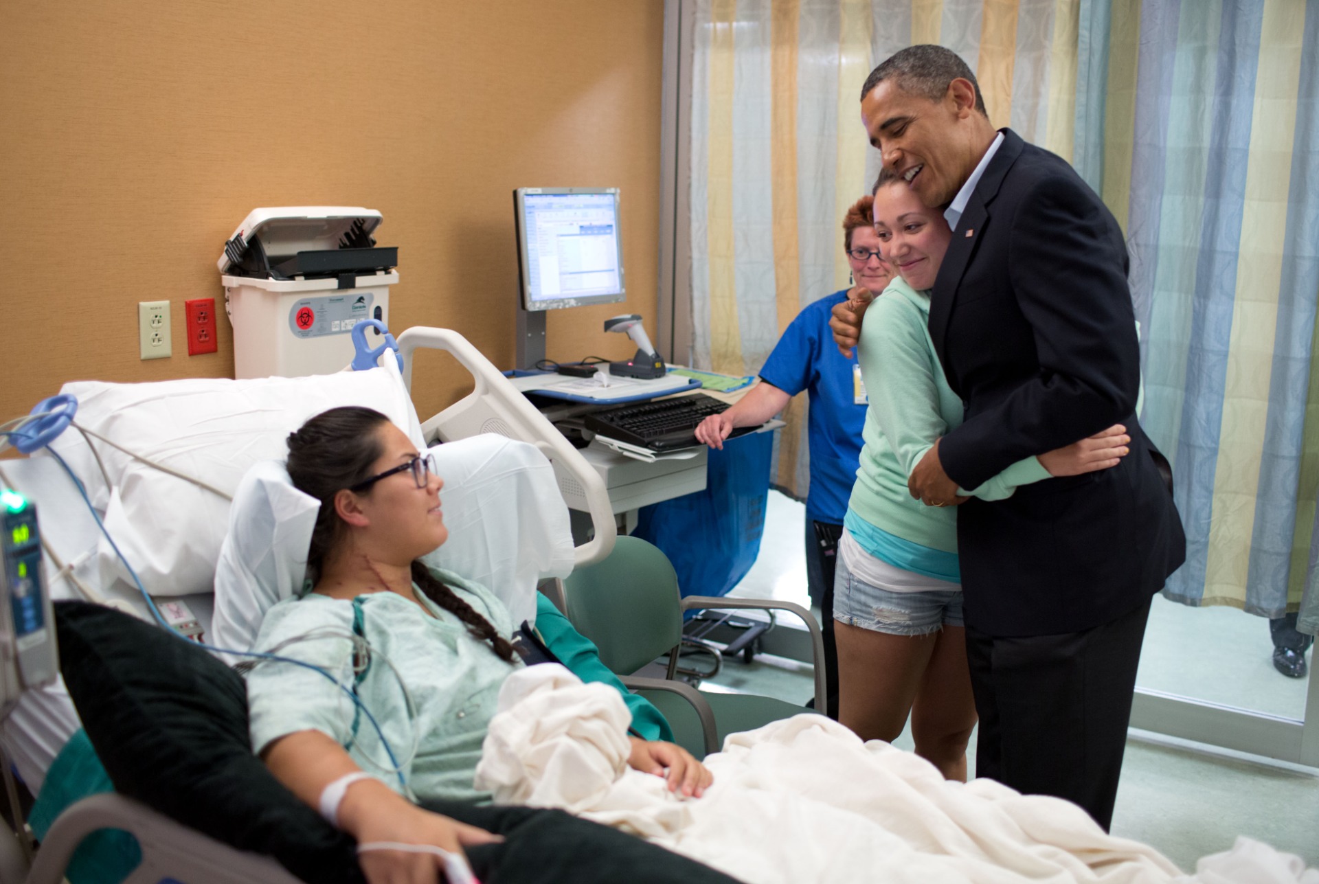 Obama encontrando-se com vítimas do massacre em Aurora em 2012